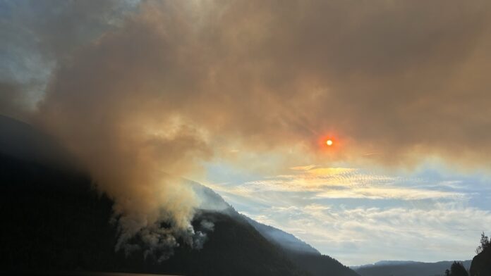 Photo of smokey skies near Wesley Ridge wildfire